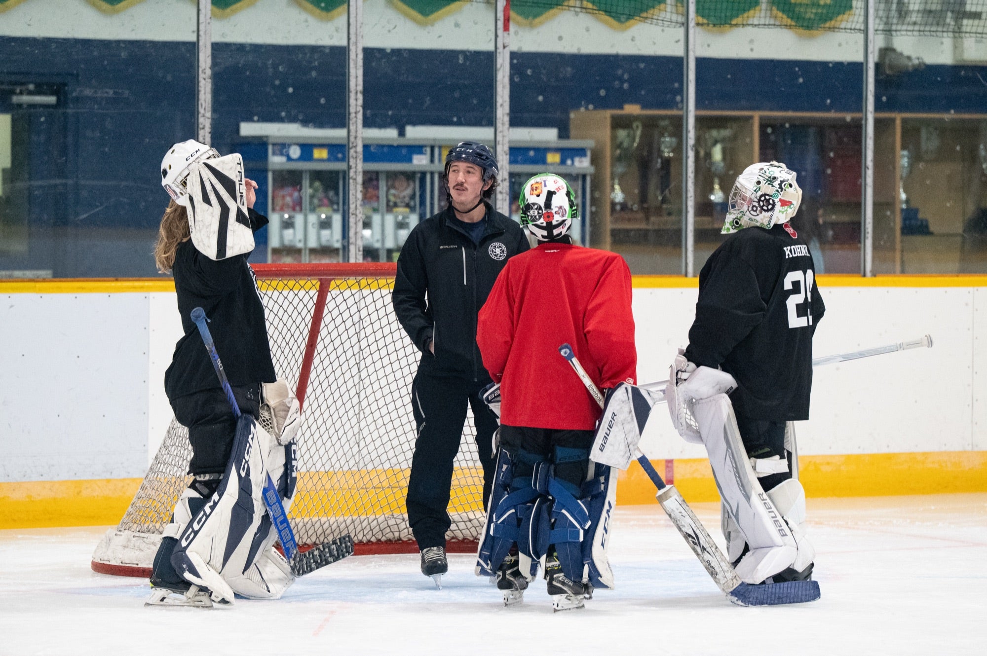 One Stop Goaltending coach teaching goalies on the ice